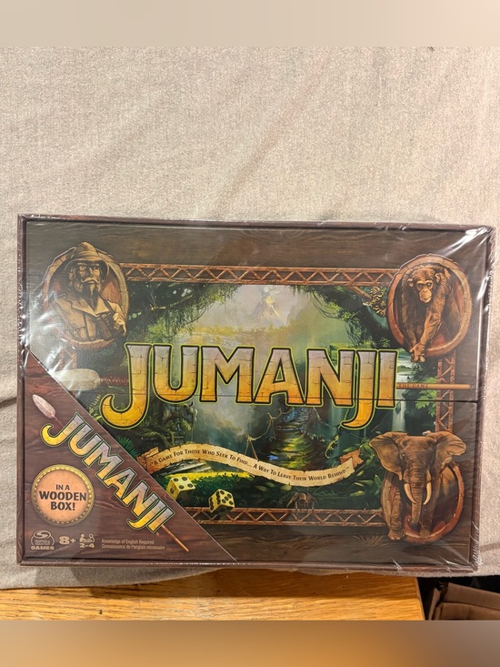 Jumanji Other - Jumanji Classic Board Game - Brown Edition. New. In wrapper. In Wooden Box